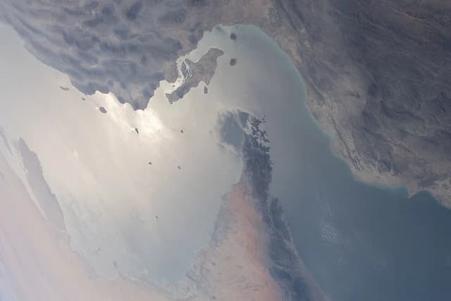 Satellite image showing the Strait of Hormuz connecting the Persian Gulf and the Gulf of Oman.