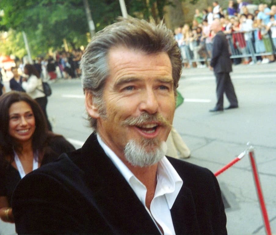 Pierce Brosnan, actor, posing at a film festival event.