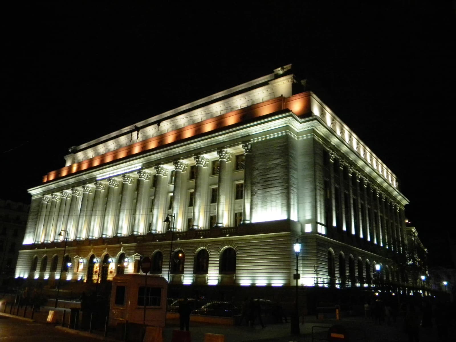 National Bank of Romania building, Bucharest, illuminated at night with neoclassical architecture.