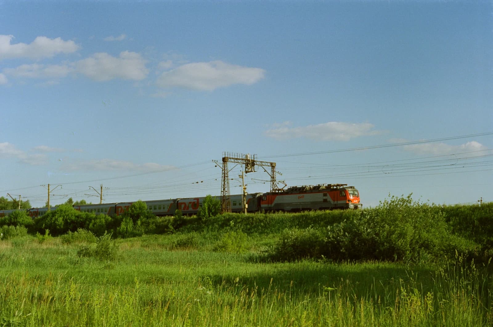 Passenger train on tracks, summer 2022, Kazan direction, Russia.