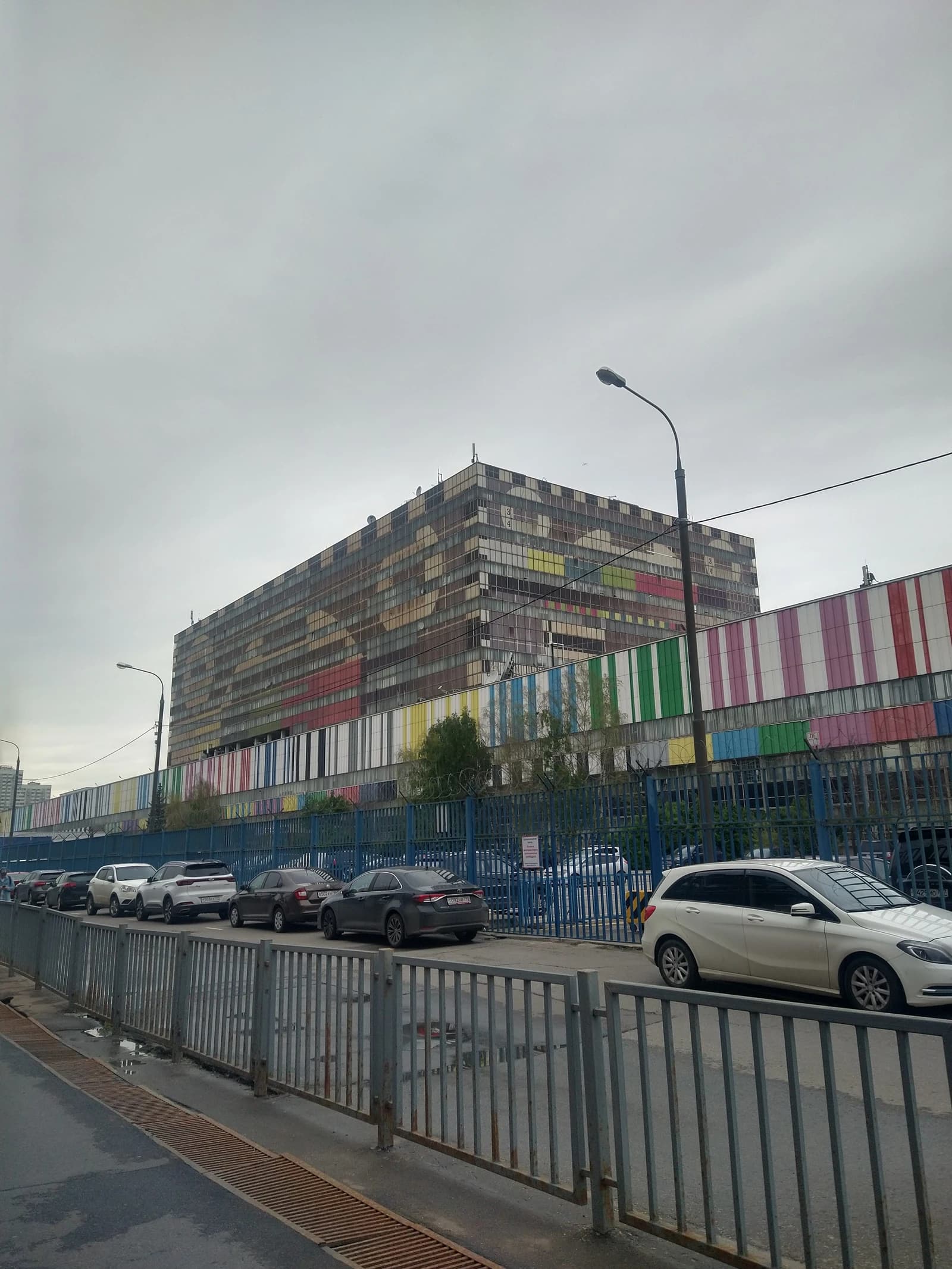 Ostankino Technical Center (Television Center) building, Moscow, Russia, under an overcast sky.