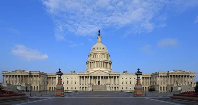The United States Capitol building, east side, with its dome prominently featured.