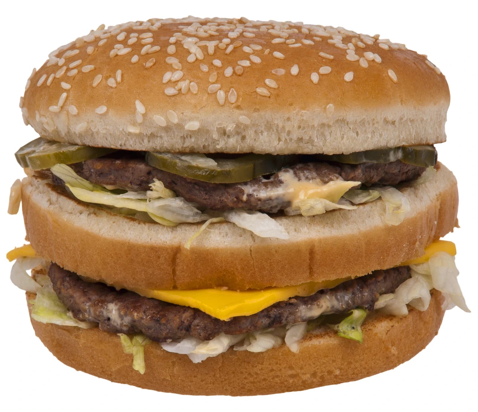 A McDonald's Big Mac hamburger on a white background, featuring two beef patties and special sauce.
