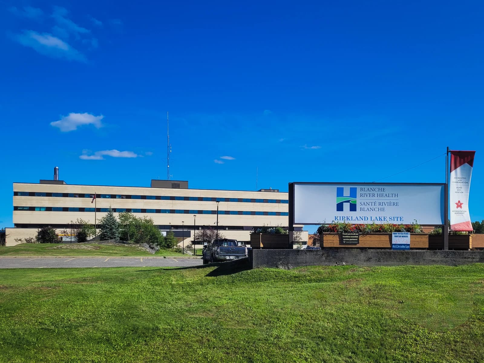 Exterior of Blanche River Health Kirkland Lake Site building under a blue sky.