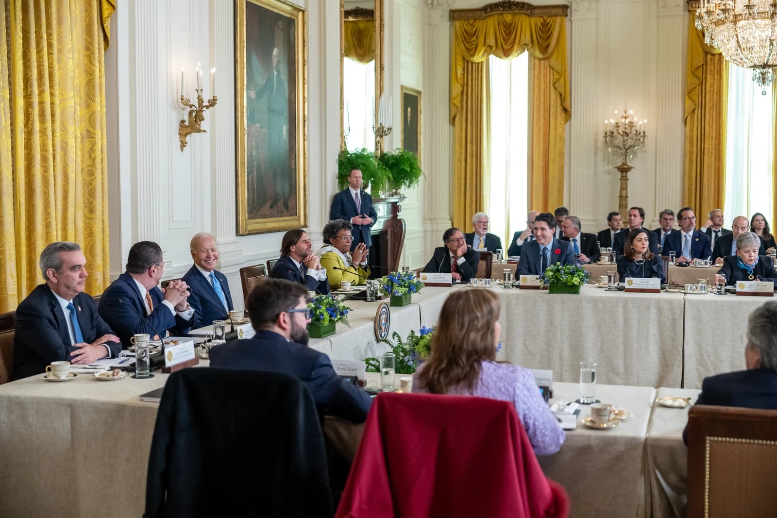 Luis Abinader, President of the Dominican Republic, seated at a long conference table during a meeting.