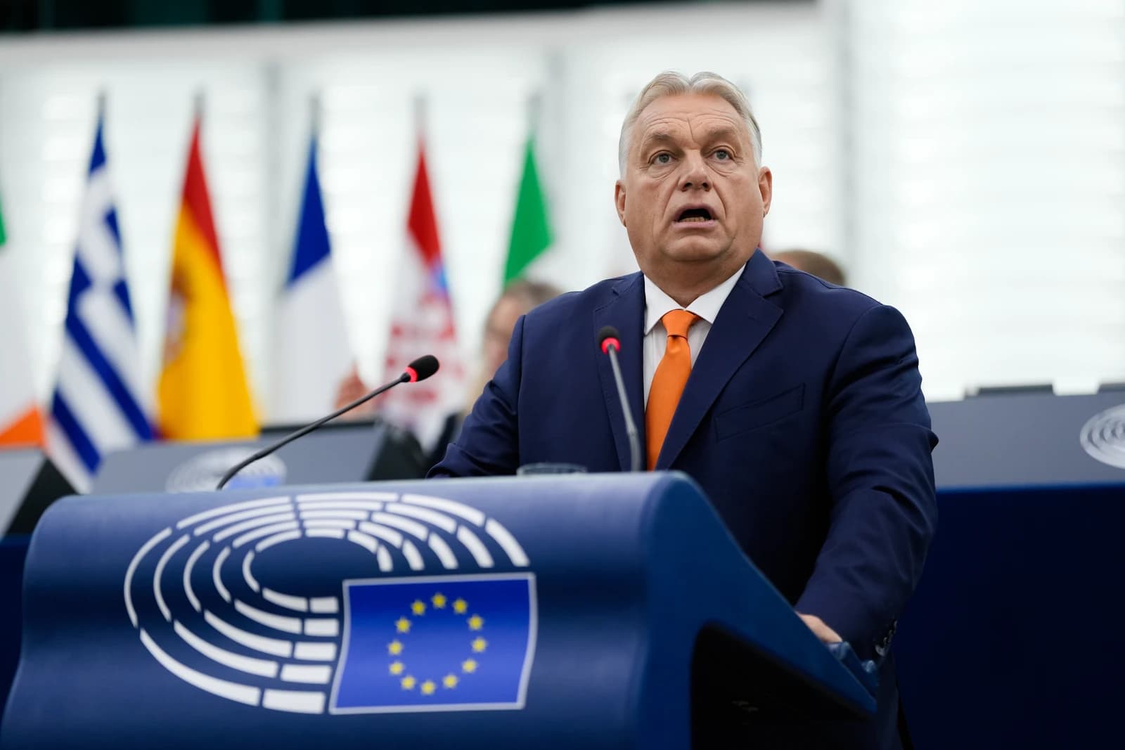 Viktor Orbán, Prime Minister of Hungary, speaking at a podium indoors.