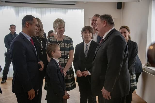 U.S. Secretary of State Pompeo interacts with individuals at U.S. Embassy in Iceland.
