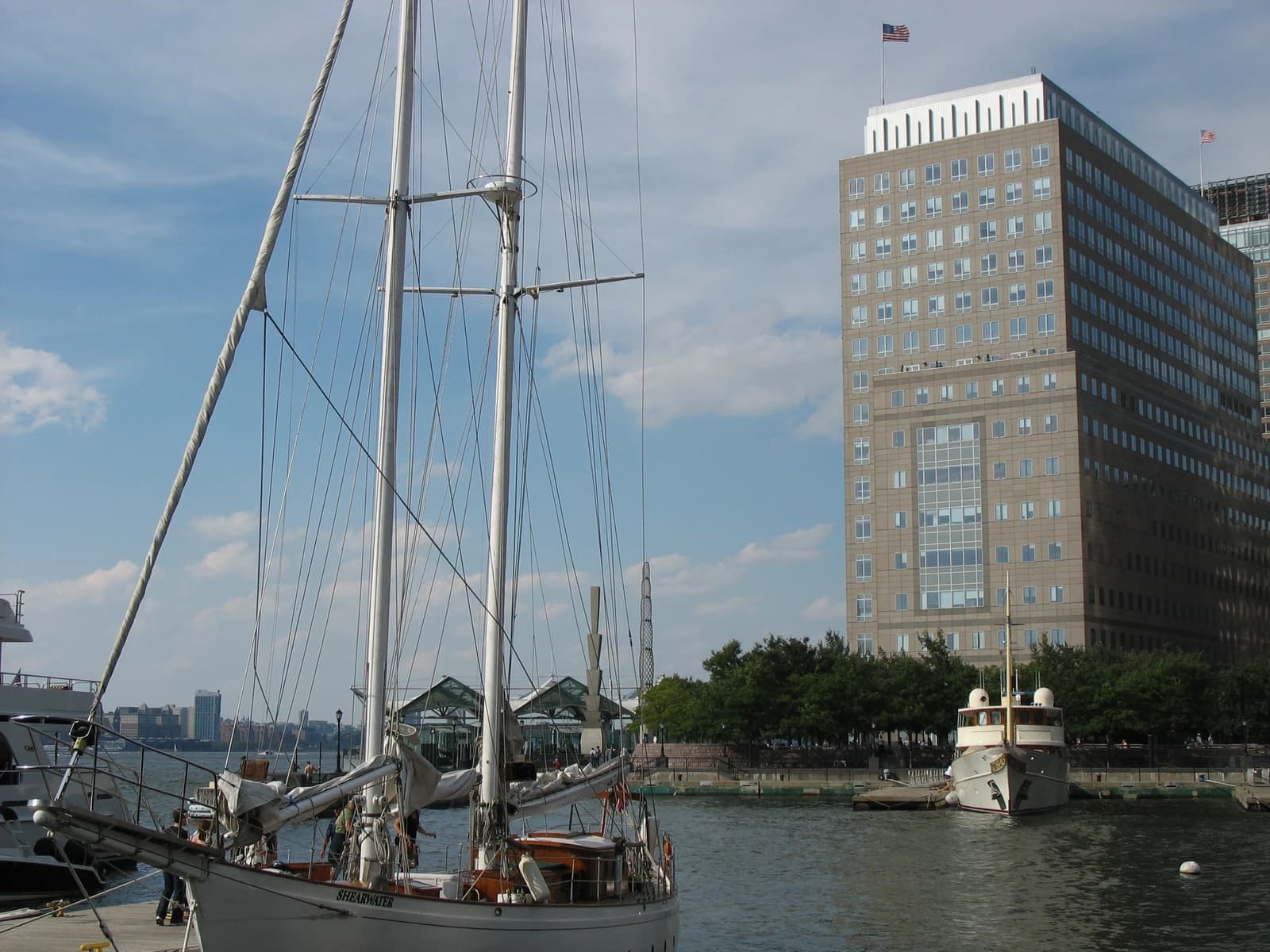 NYMEX building in Manhattan, United States, seen from the water with boats.
