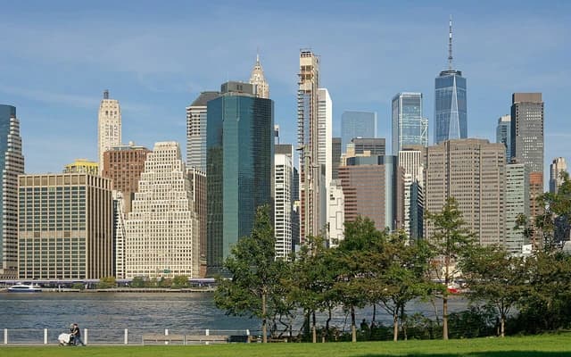 Lower Manhattan skyline viewed from across the East River on a clear day.