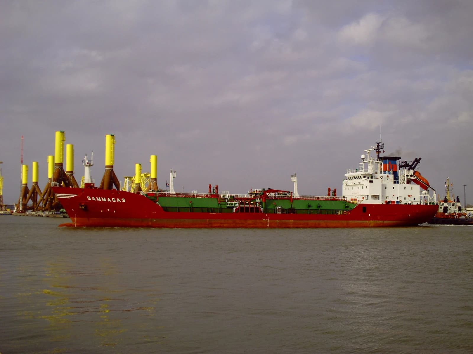 An LNG carrier ship named Gammagas navigates through a body of water.