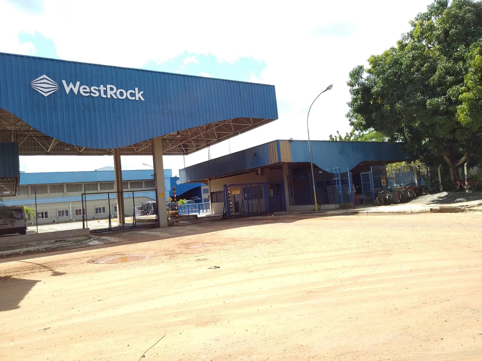 Entrance gate of a WestRock facility with the company name visible.
