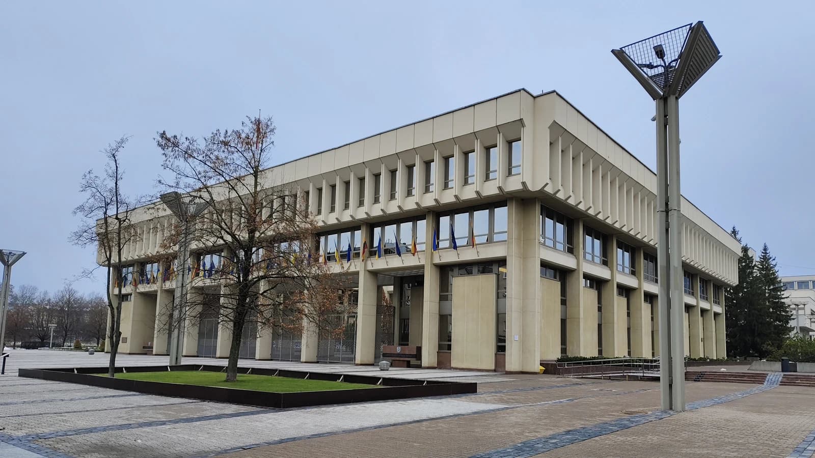 Exterior of the Lithuanian Parliament building in Vilnius on an overcast day.