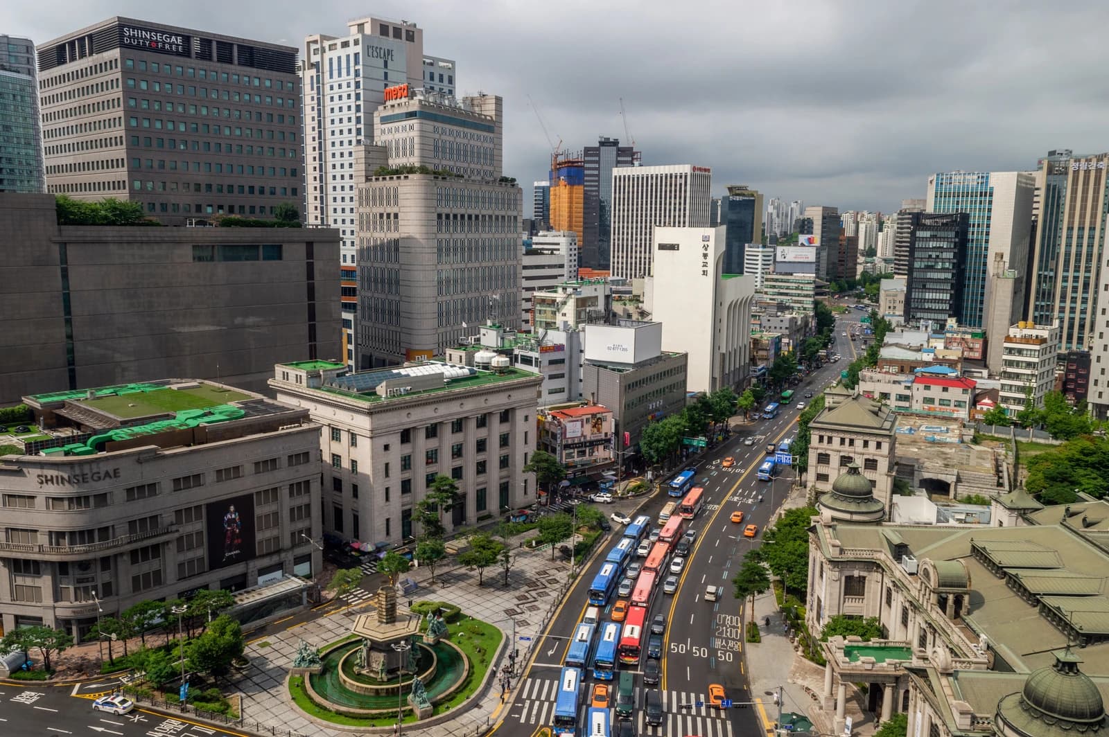 Aerial view of Namdaemun-ro street in Seoul, South Korea, showing buildings and traffic.