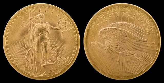 Front and back of a 1907 American twenty dollar gold coin.