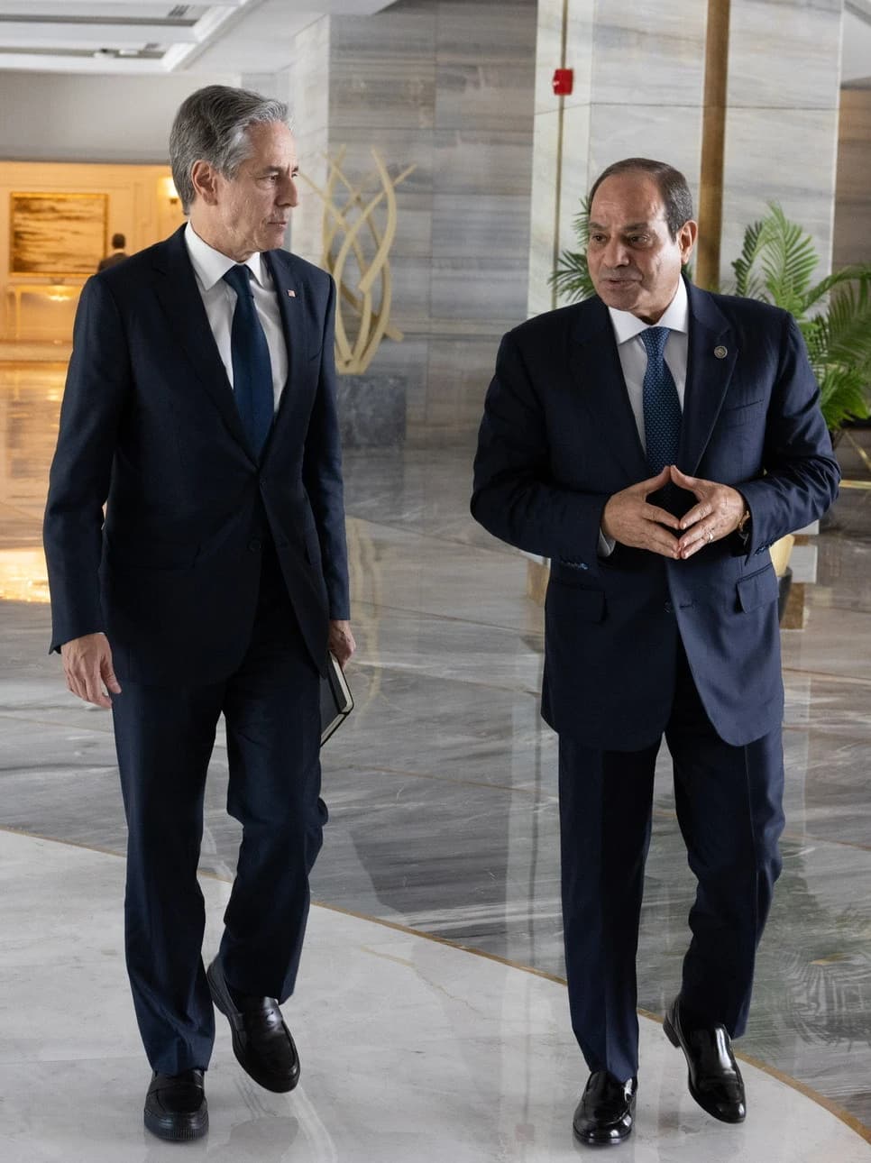 Antony Blinken and Abdel Fattah El-Sisi walking together in Al Alamein, Egypt.