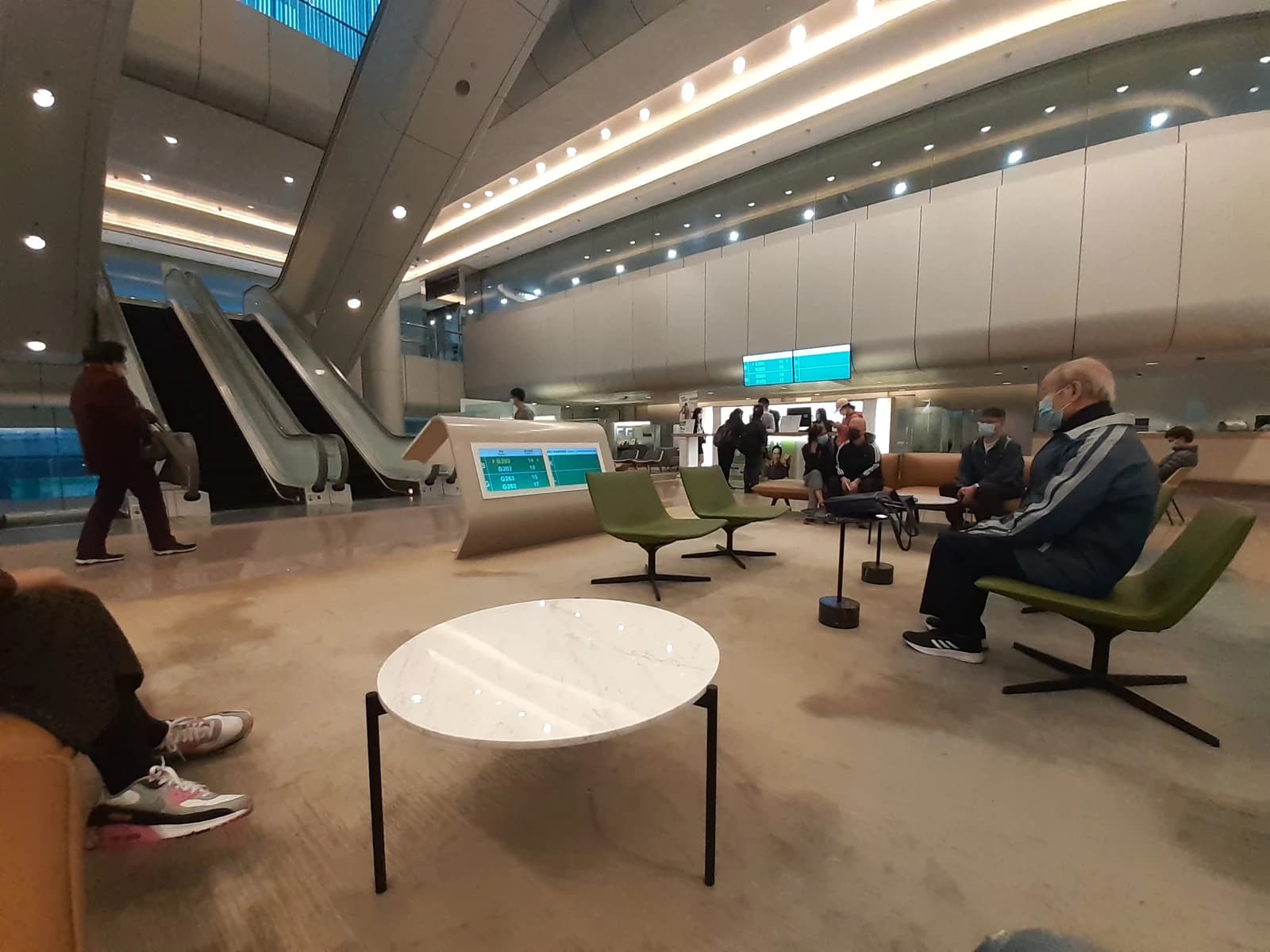 People waiting in the interior lobby of Hang Seng Bank New Headquarters Building.