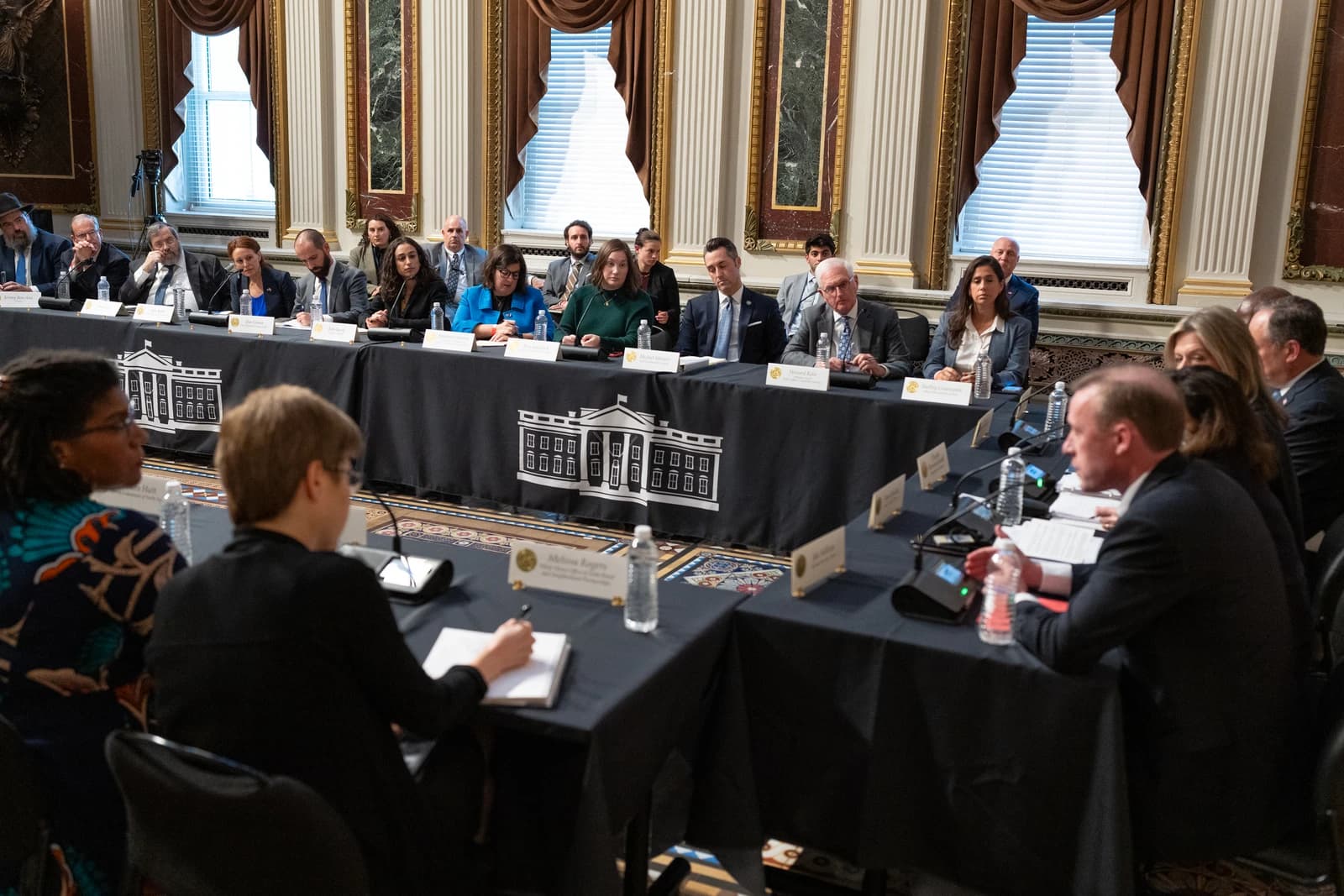 Brett McGurk, White House Coordinator for the Middle East, is seated at a large conference table during a meeting.