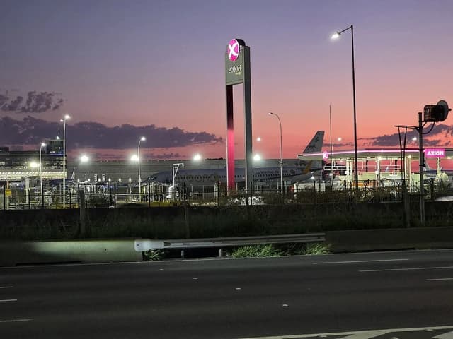 Axion Aviation fuel plant at Jorge Newbery Airport in Buenos Aires at dusk.