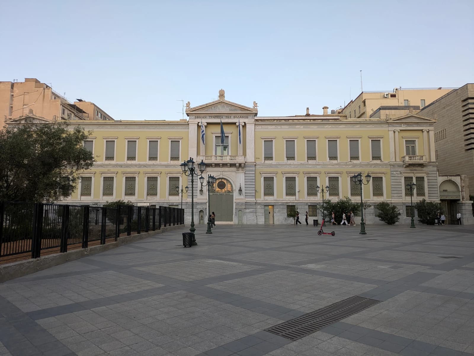 Exterior of the National Bank of Greece building in Athens, featuring classical architecture.