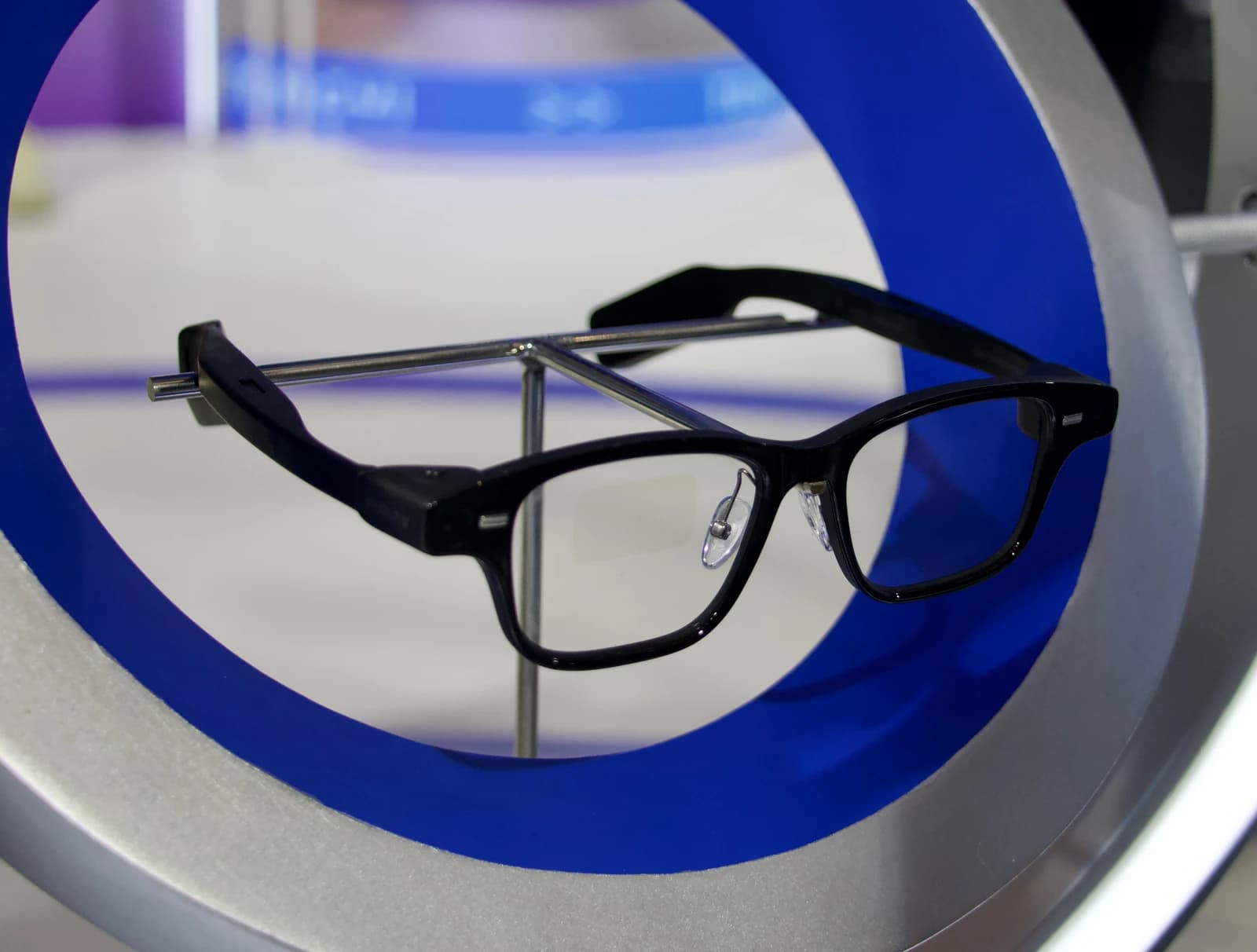 Alibaba Quark Glasses, also known as Qwen N1 AI glasses, displayed on a stand.