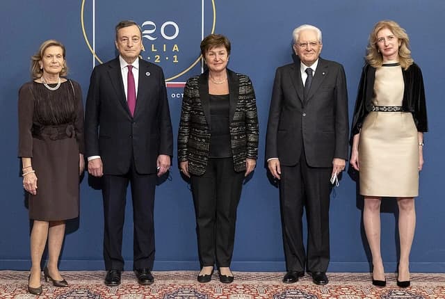 Kristalina Georgieva, Mario Draghi, and Sergio Mattarella standing at the G20 Rome Summit.