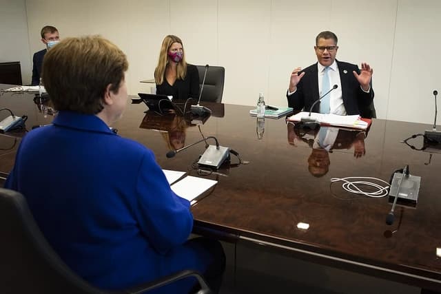 The Rt Hon Alok Sharma MP speaking at a conference table at the IMF.