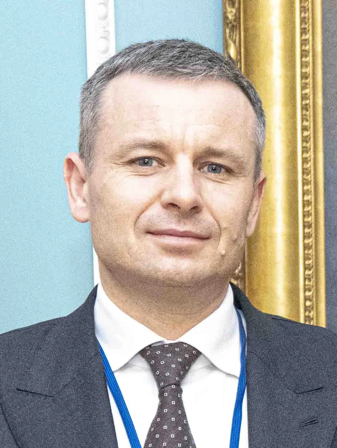 Serhiy Marchenko, Ukrainian Finance Minister, looking at the camera indoors.