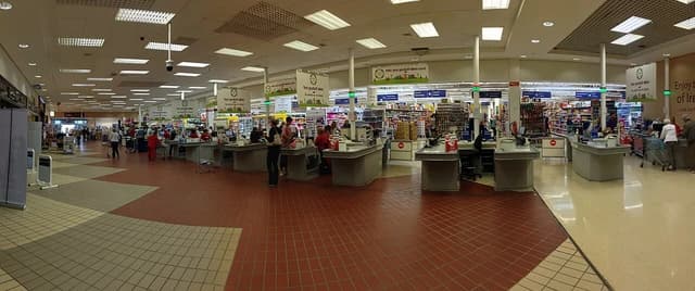 Shoppers use self-checkout machines inside a Tesco supermarket in Greystones, County Wicklow, Ireland.