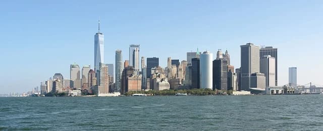 Manhattan skyline from Upper New York Bay with prominent skyscrapers visible.