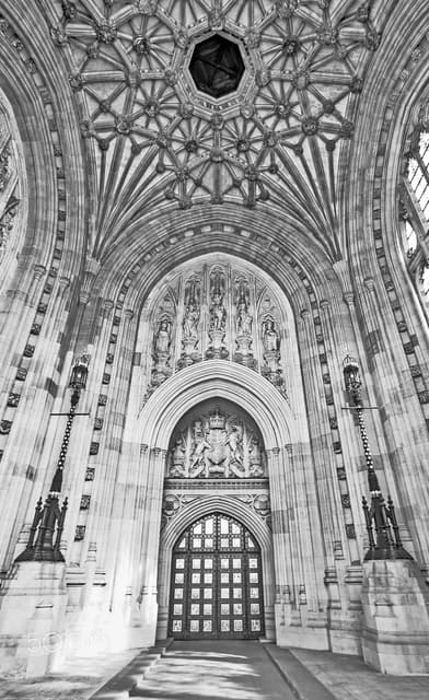 Intricate architectural details of the Royal Entrance at the Houses of Parliament, London.