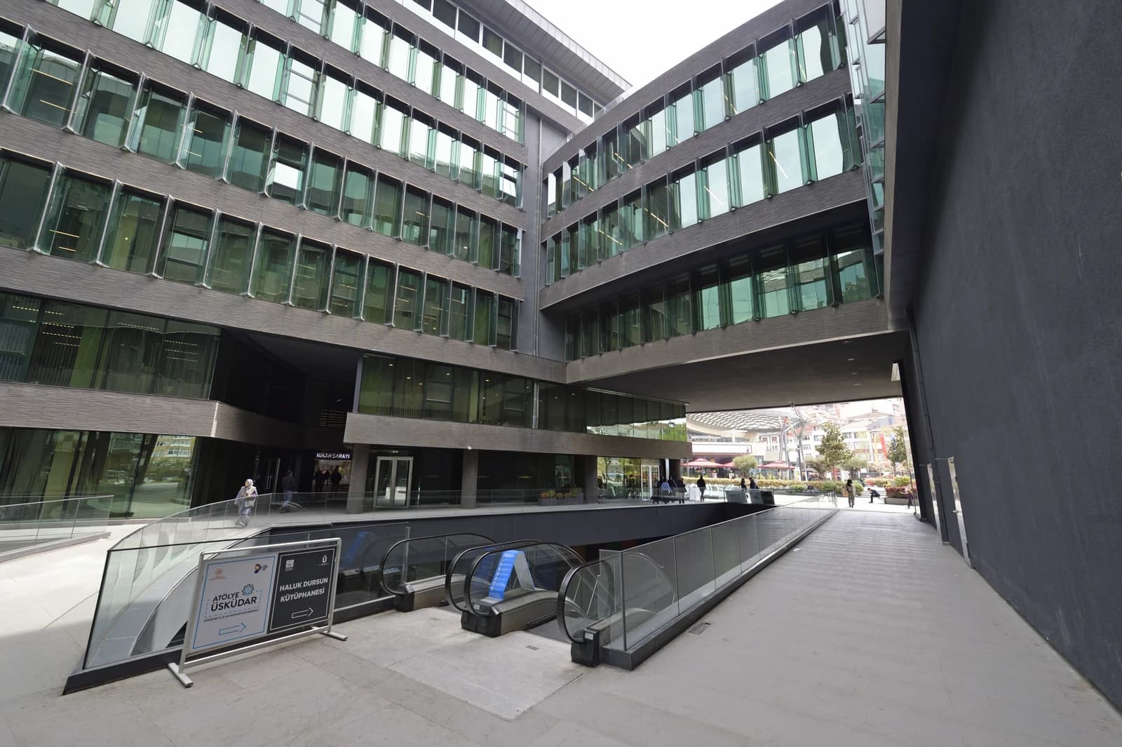 Exterior view of the Istanbul Üsküdar Municipality building with glass windows.