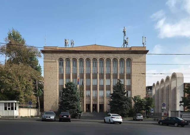 Constitutional Court building, a beige stone structure with arched windows, in Yerevan.