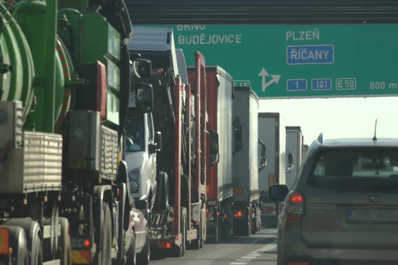 Trucks and cars stopped in a traffic jam on a highway near Ricany, Czech Republic.