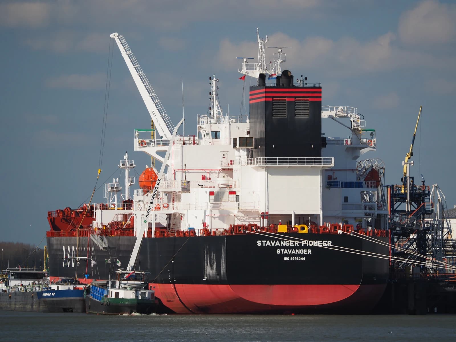 Oil tanker Stavanger Pioneer docked at a port facility.