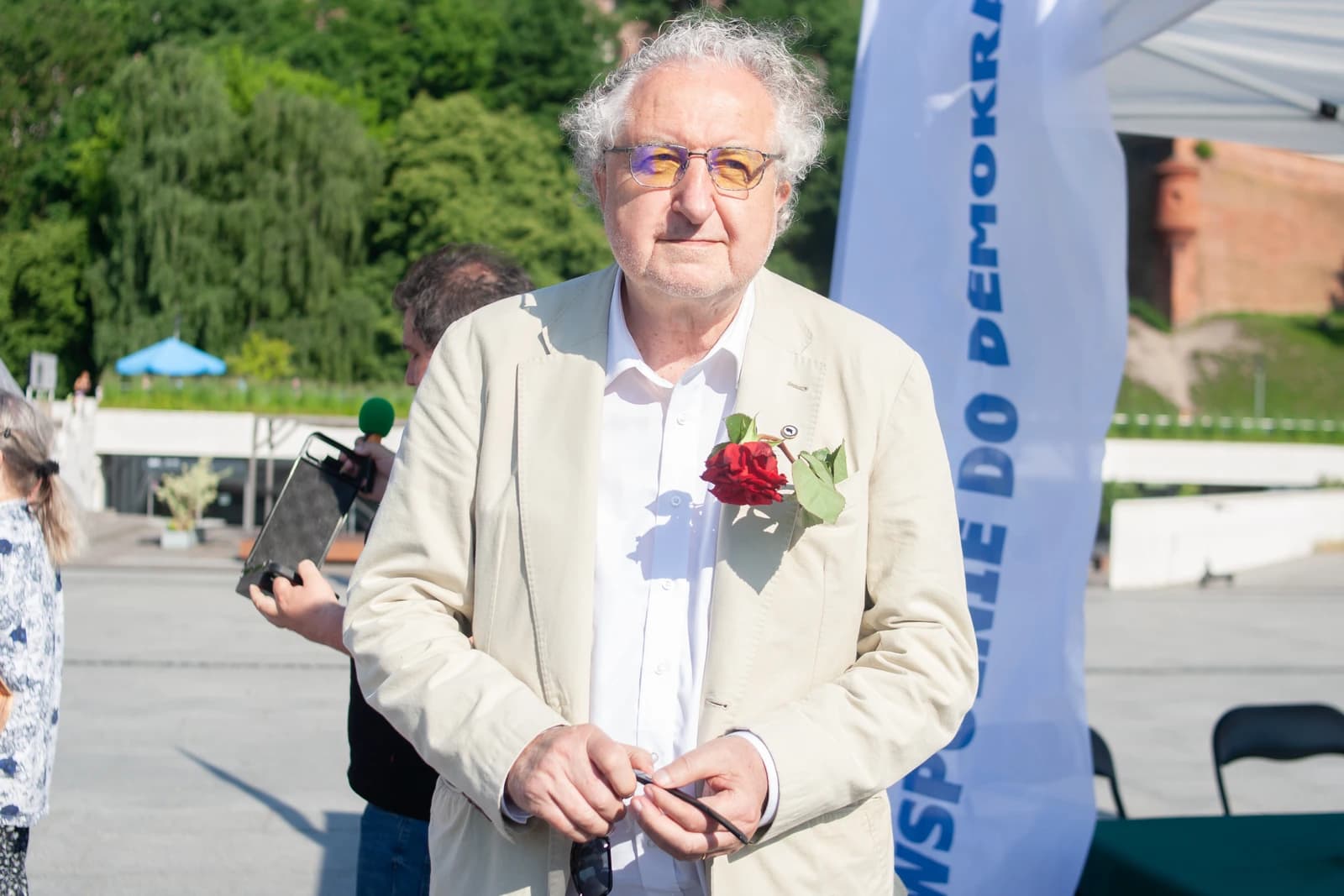 Andrzej Rzepliński, former President of the Constitutional Tribunal, stands outdoors.