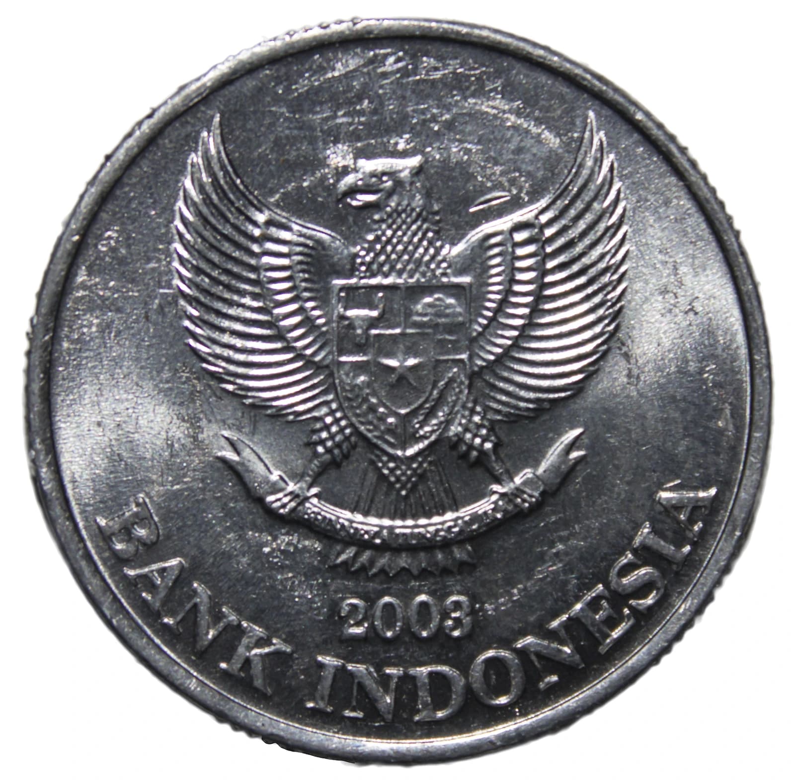 Close-up of an Indonesian 500 rupiah coin with the national emblem Garuda Pancasila.