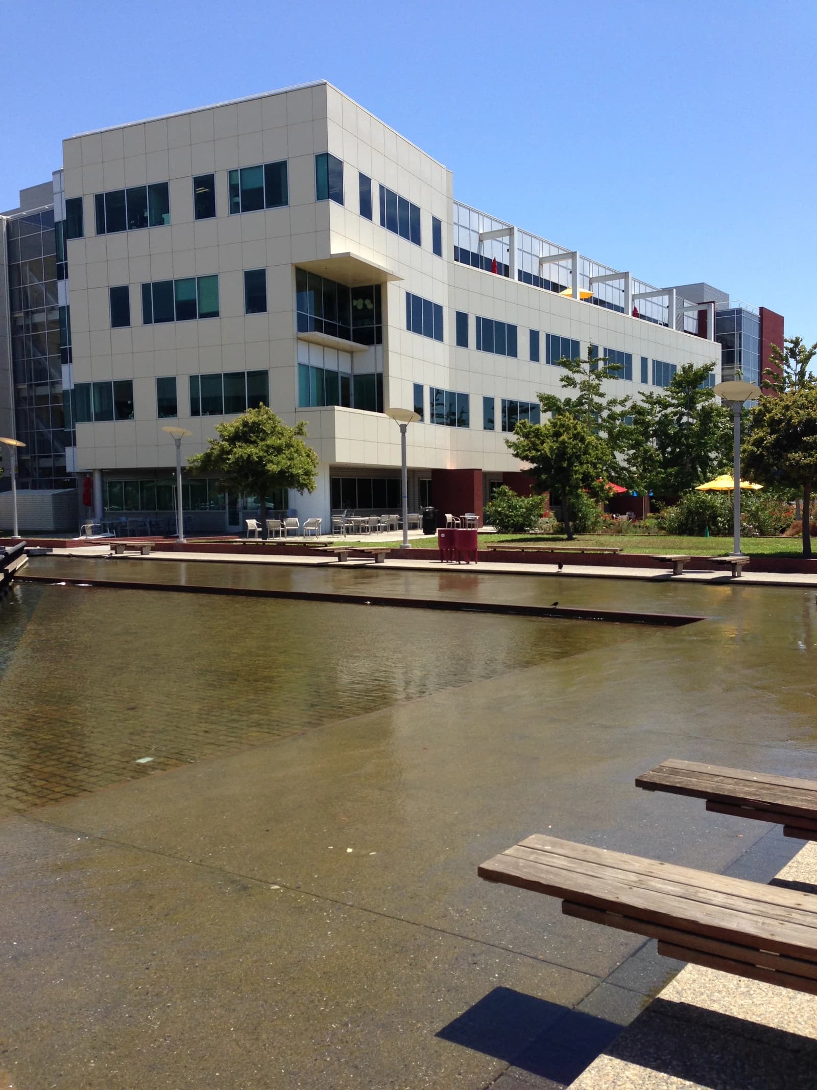 Building at Google's Crittenden campus, with a reflective pool in the foreground.