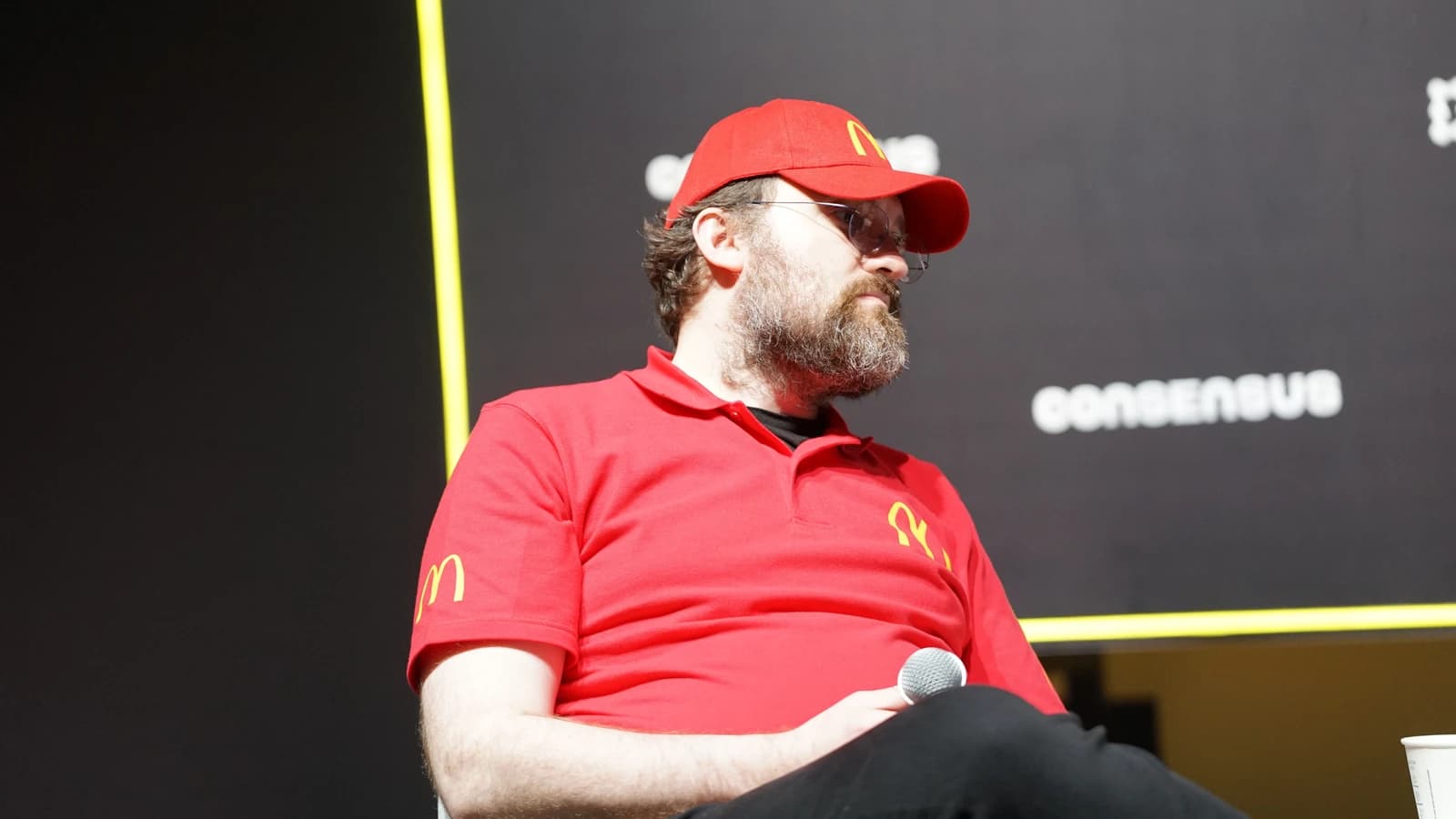 Charles Hoskinson, co-founder of Cardano, speaking at a conference.