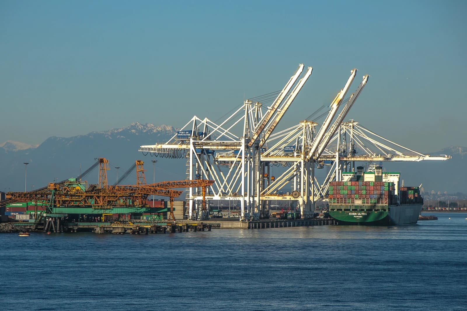 Roberts Bank coal port with cranes and a container ship in British Columbia.
