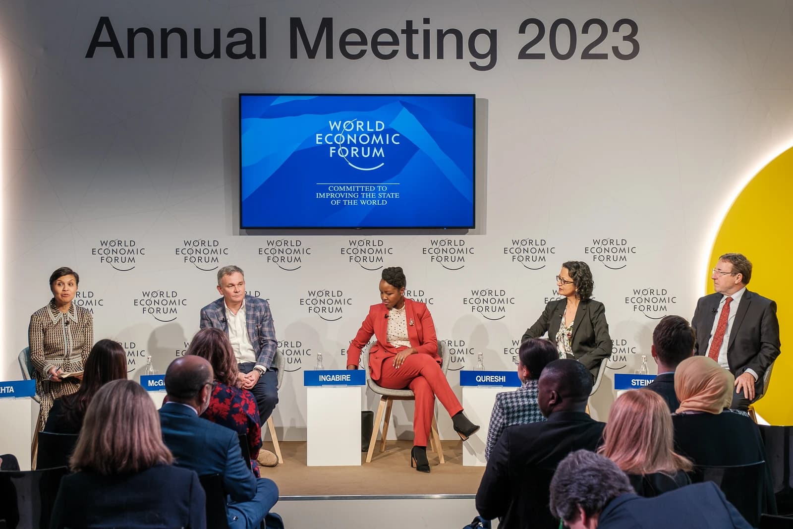 Panelists discussing on stage at the World Economic Forum Annual Meeting.