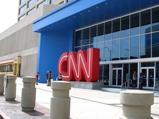 Exterior of CNN Center in Atlanta, Georgia, with large red CNN logo.