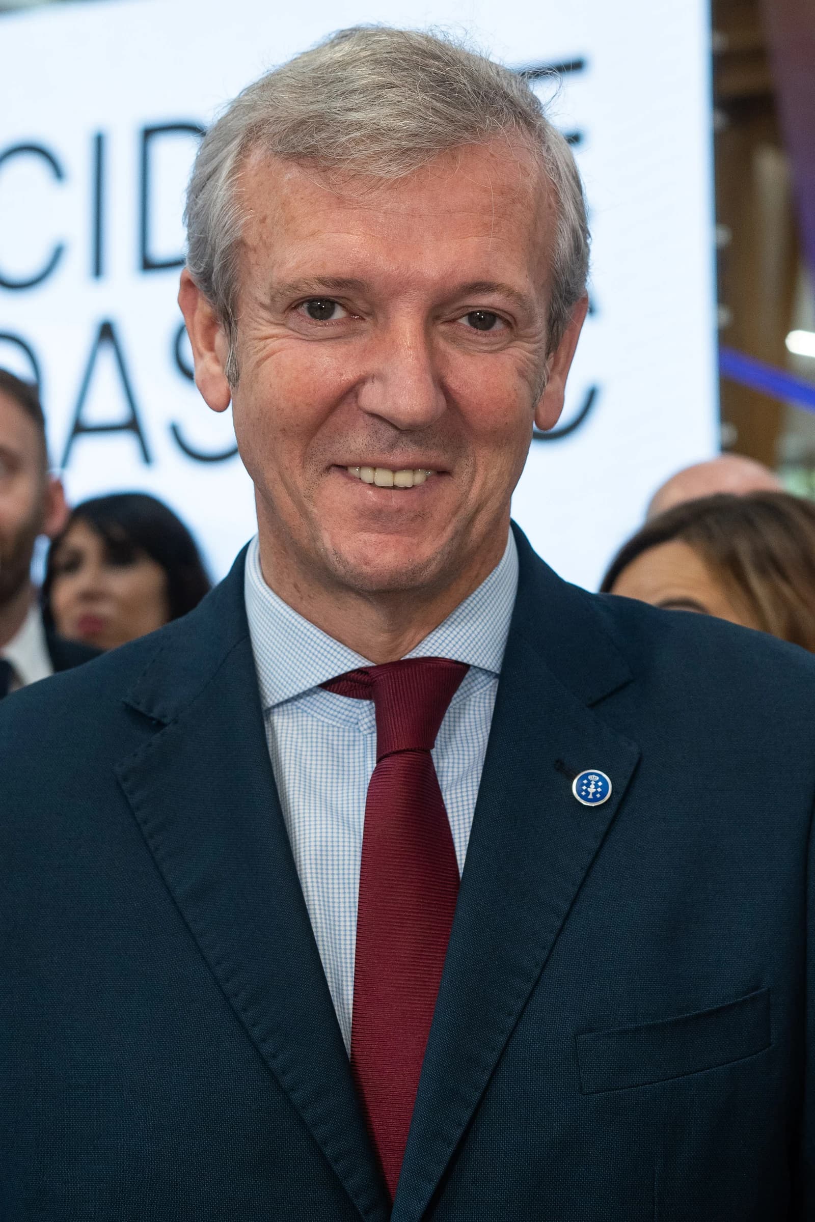 Alfonso Rueda, president of the Xunta de Galicia, smiles while attending an event.