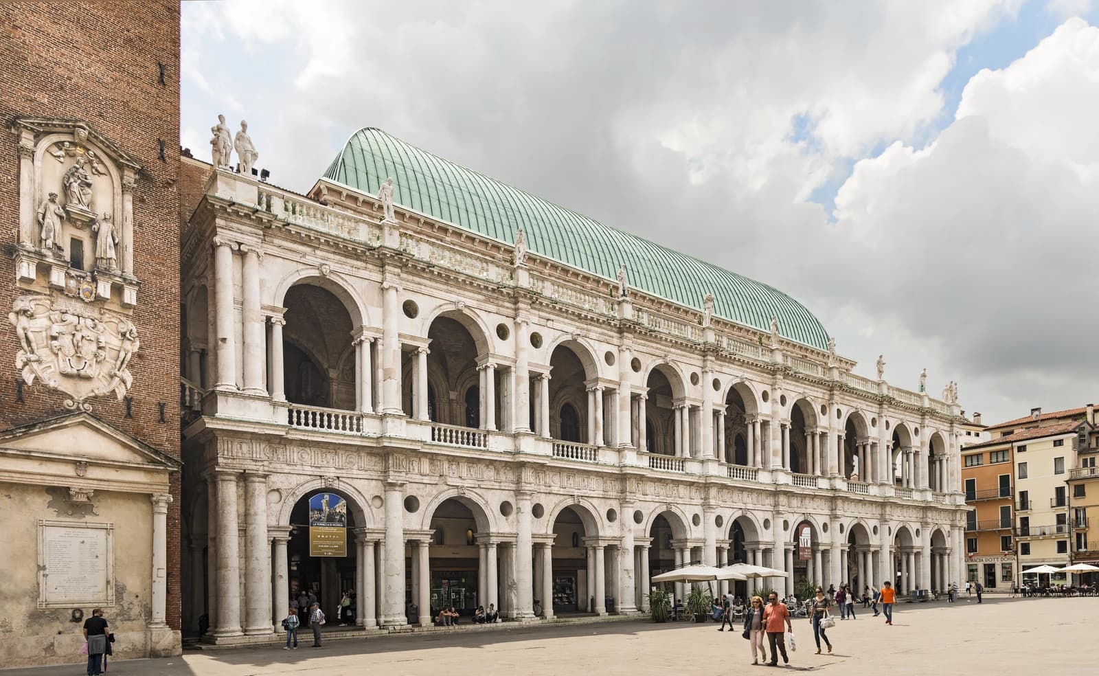 Basilica Palladiana, a large white architectural building with arches, in Vicenza, Italy.