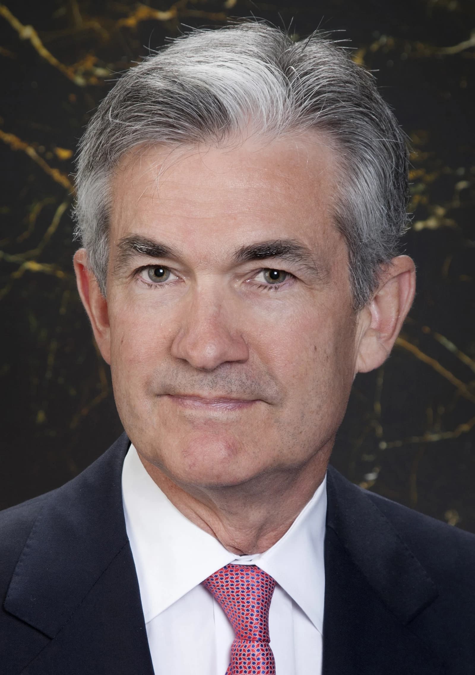 Jerome Powell, Chair of the Federal Reserve, in a professional headshot.