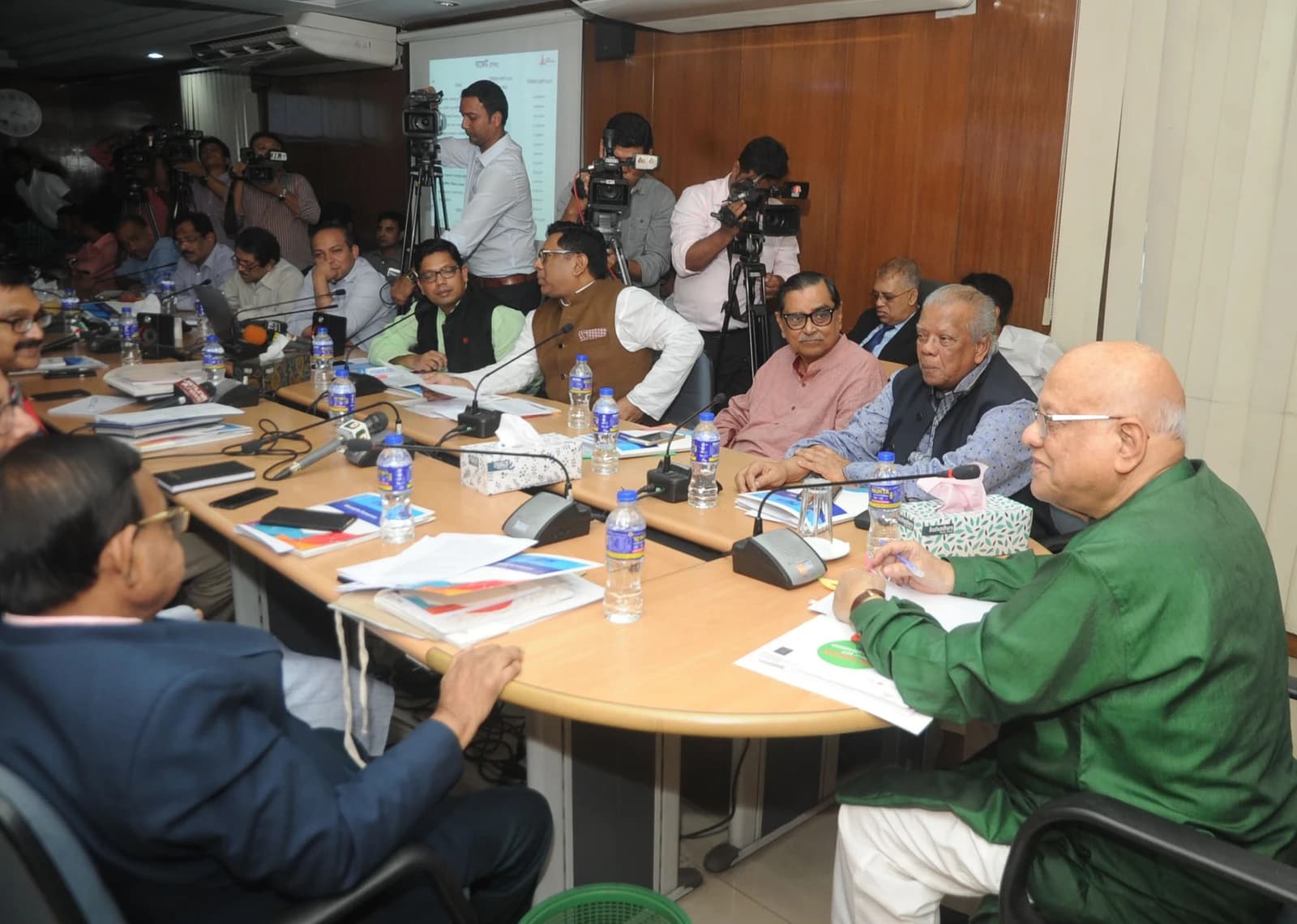 Officials and media attend an advisory committee meeting at the Ministry of Finance, Bangladesh.