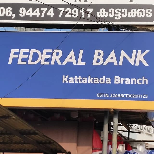 Federal Bank branch signage for the Kattakada location, with contact information.