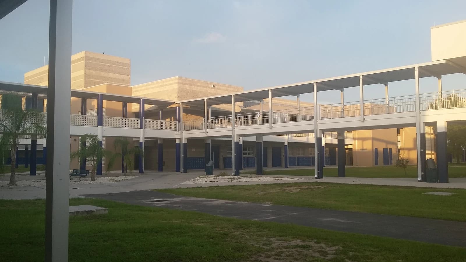 Exterior view of North Port High School campus with covered walkways.