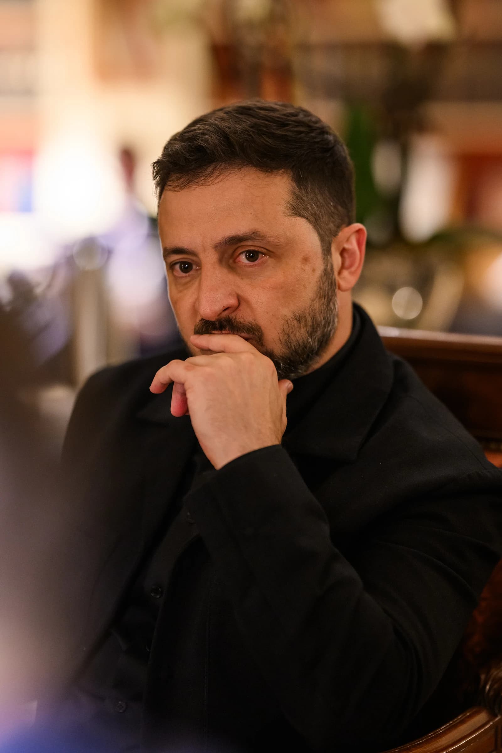 Ukrainian President Volodymyr Zelenskyy waits in the White House Library.