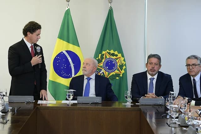 Luiz Inácio Lula da Silva, President of Brazil, sits at a table during a meeting.