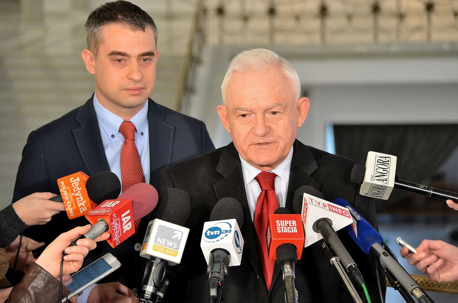 Leszek Miller, former Prime Minister of Poland, speaks at a press conference with Krzysztof Gawkowski.